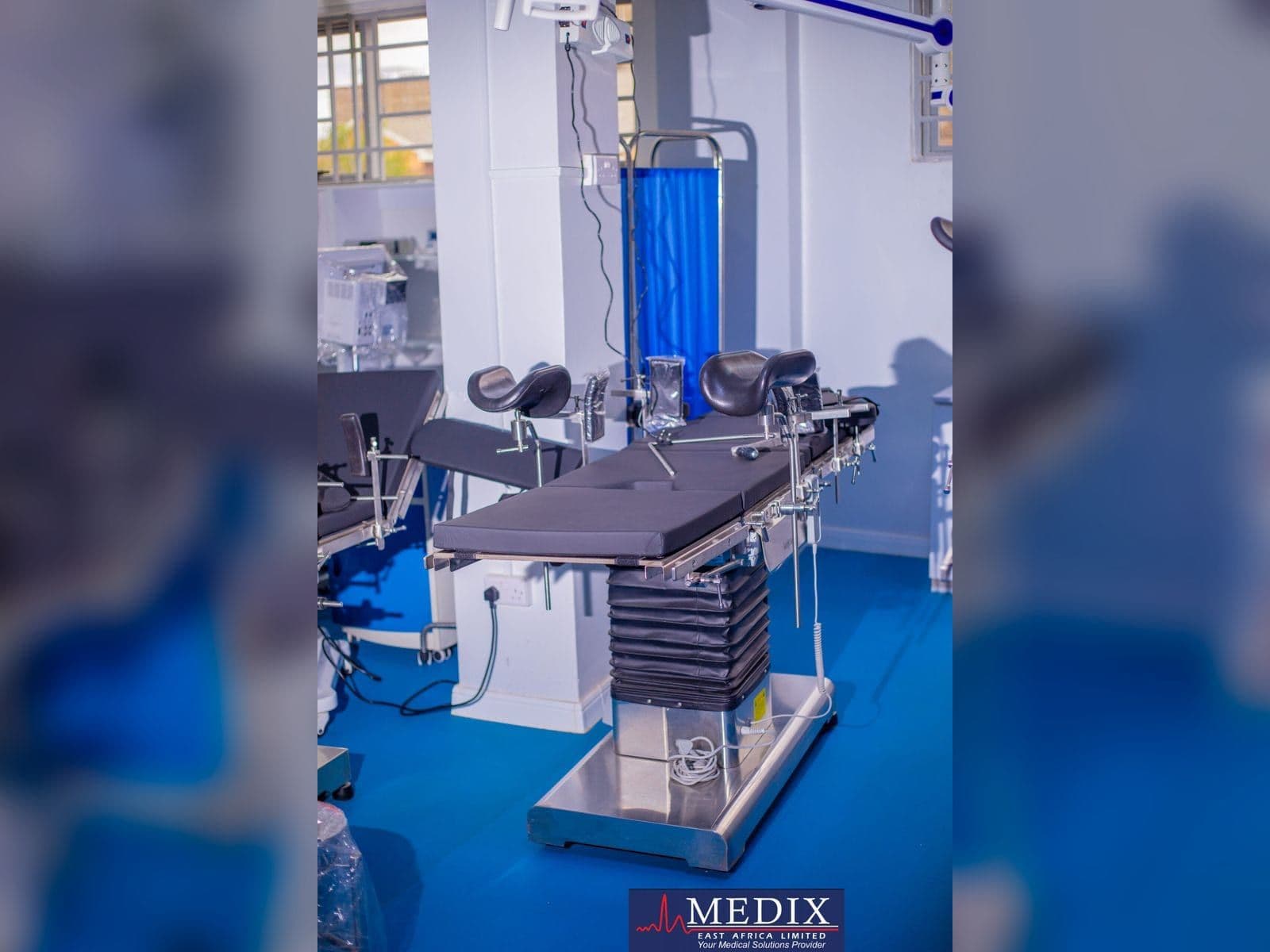 Medix team loading equipment for delivery to a healthcare facility
